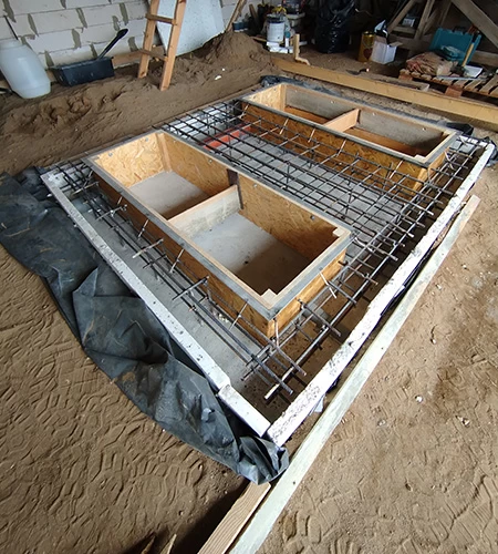 Forming the pits for an in-ground double scissor lift